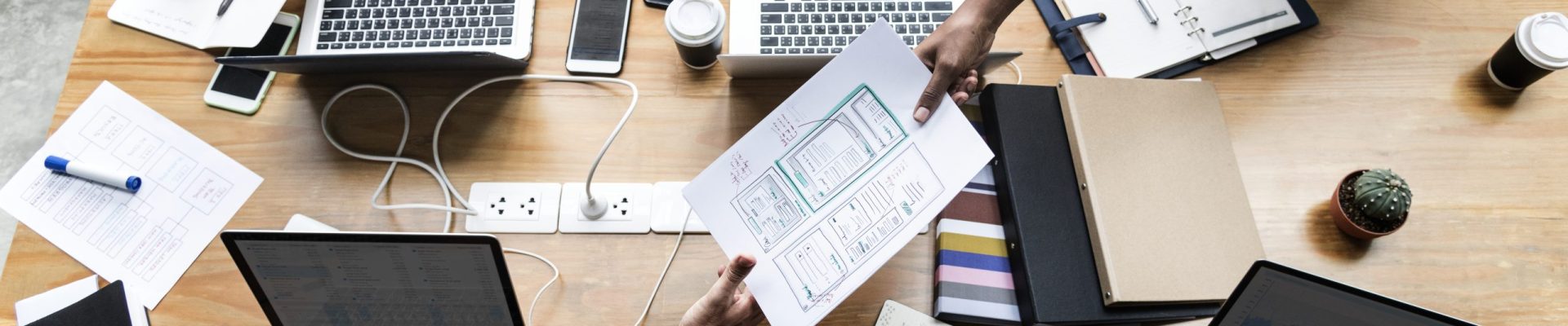 Group of people working on website template